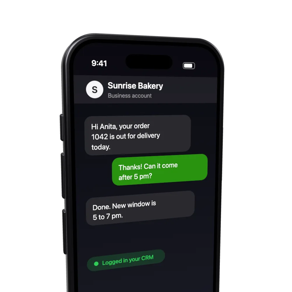 A phone showing a business messaging conversation with a customer